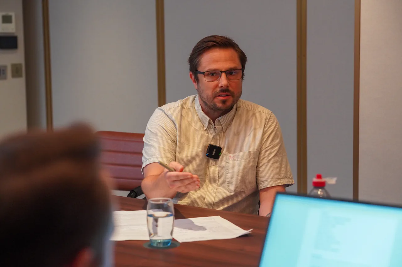 A participant contributing to a small working discussion
