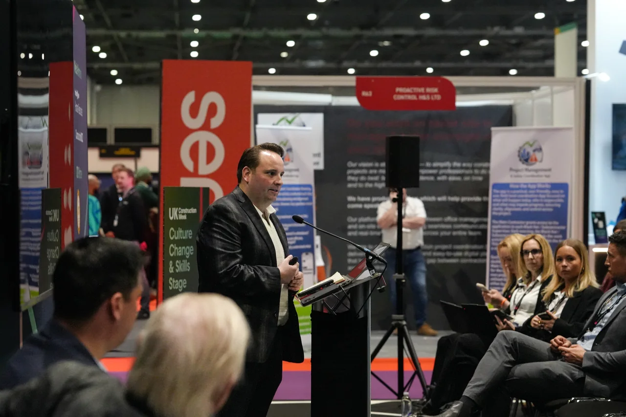 A construction presentation being delivered to an industry audience